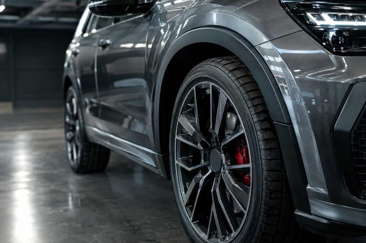 Close-up of a widened arch and large alloy wheel.
