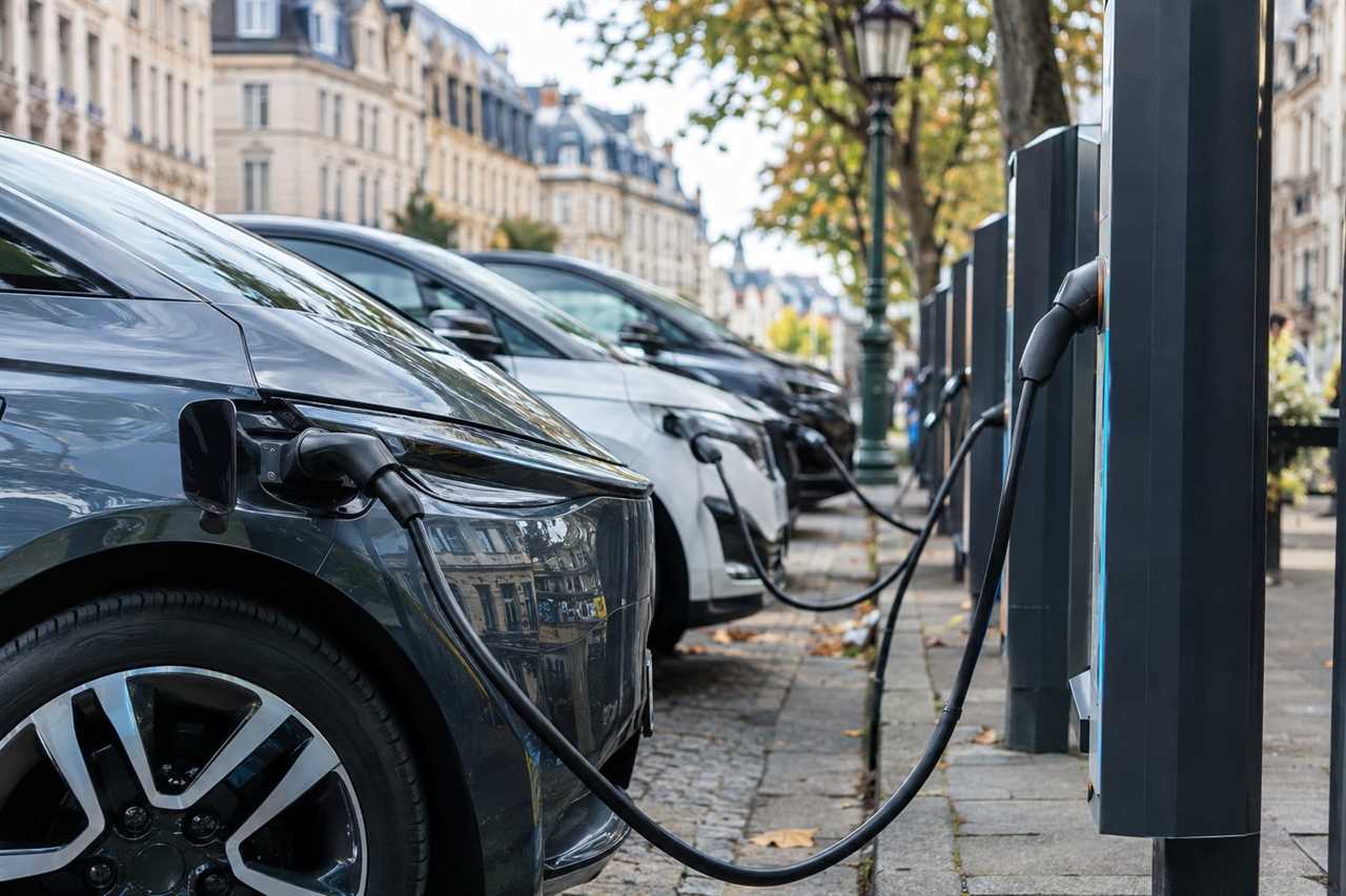 Electric cars charging at a city station