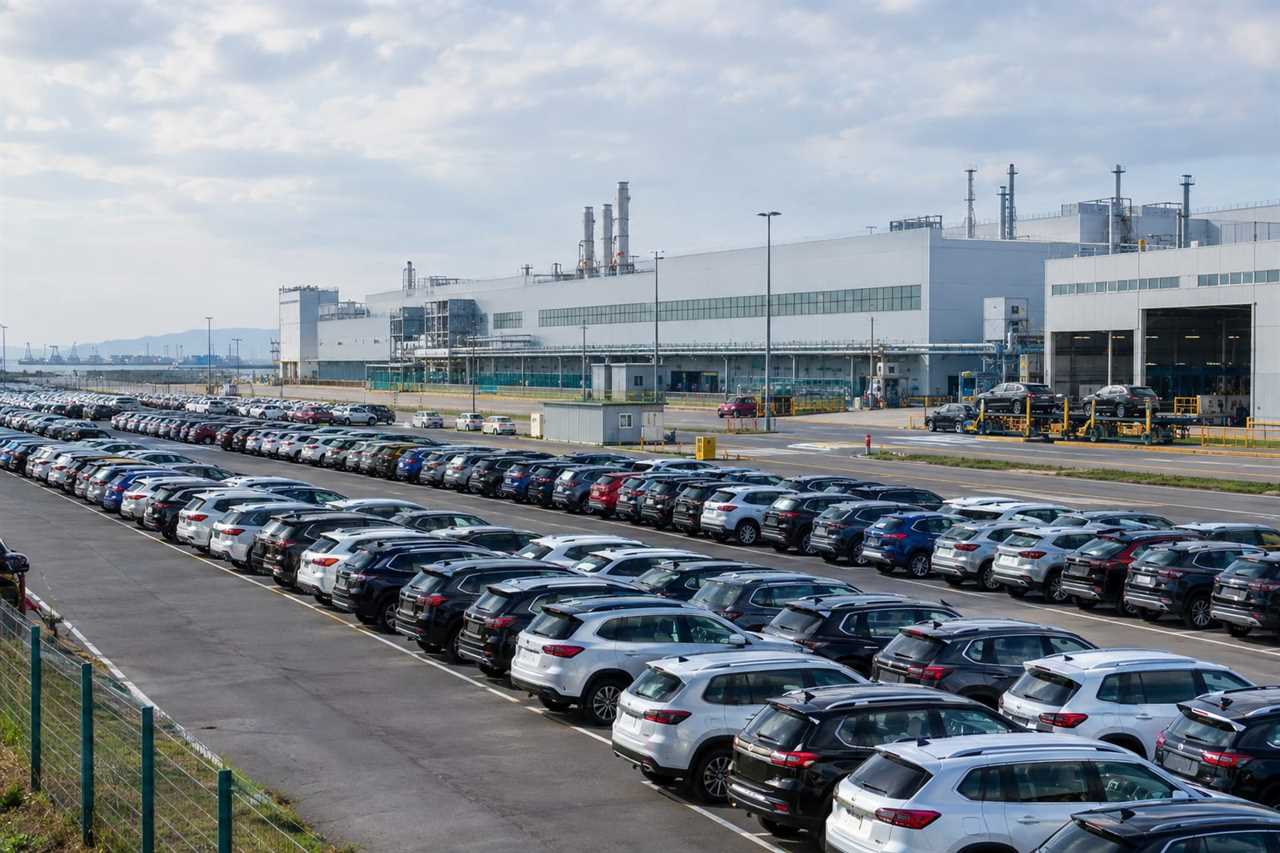 Factory yard symbolizing joint-venture production networks.