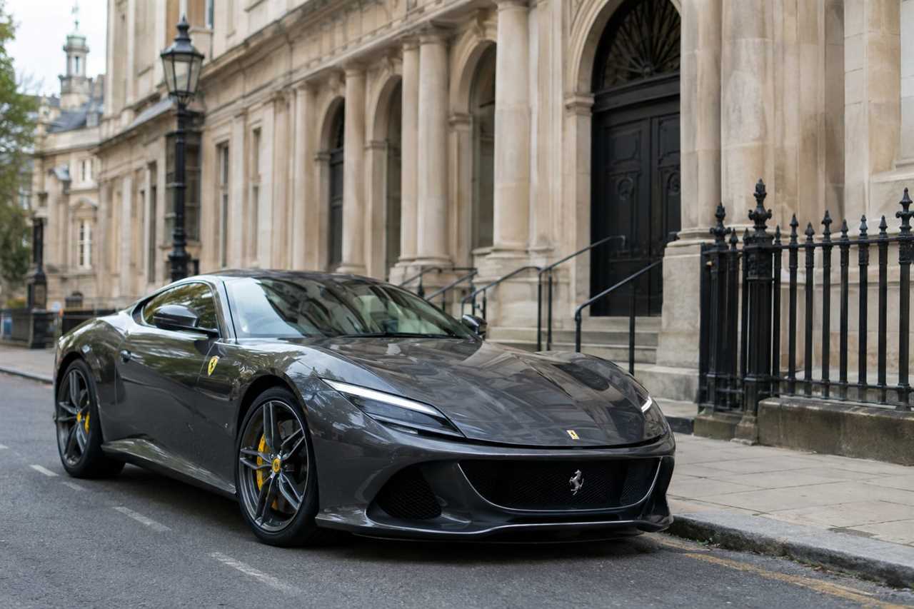 Luxury car parked near a courthouse