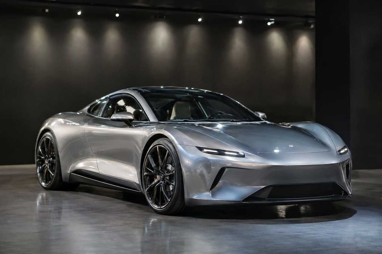 Electric sports car showcased in a modern showroom