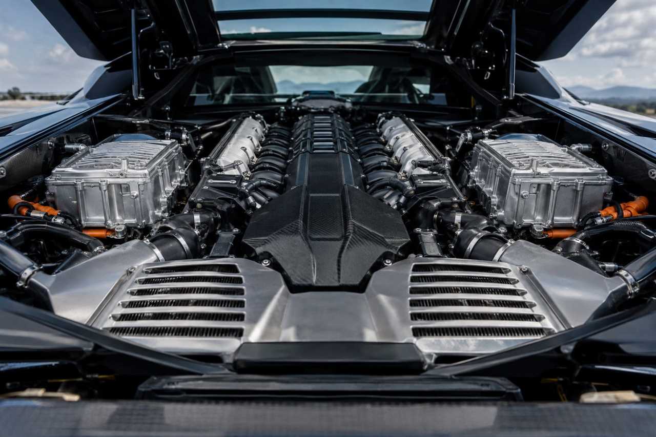 Hybrid V12 engine bay with electric motor components