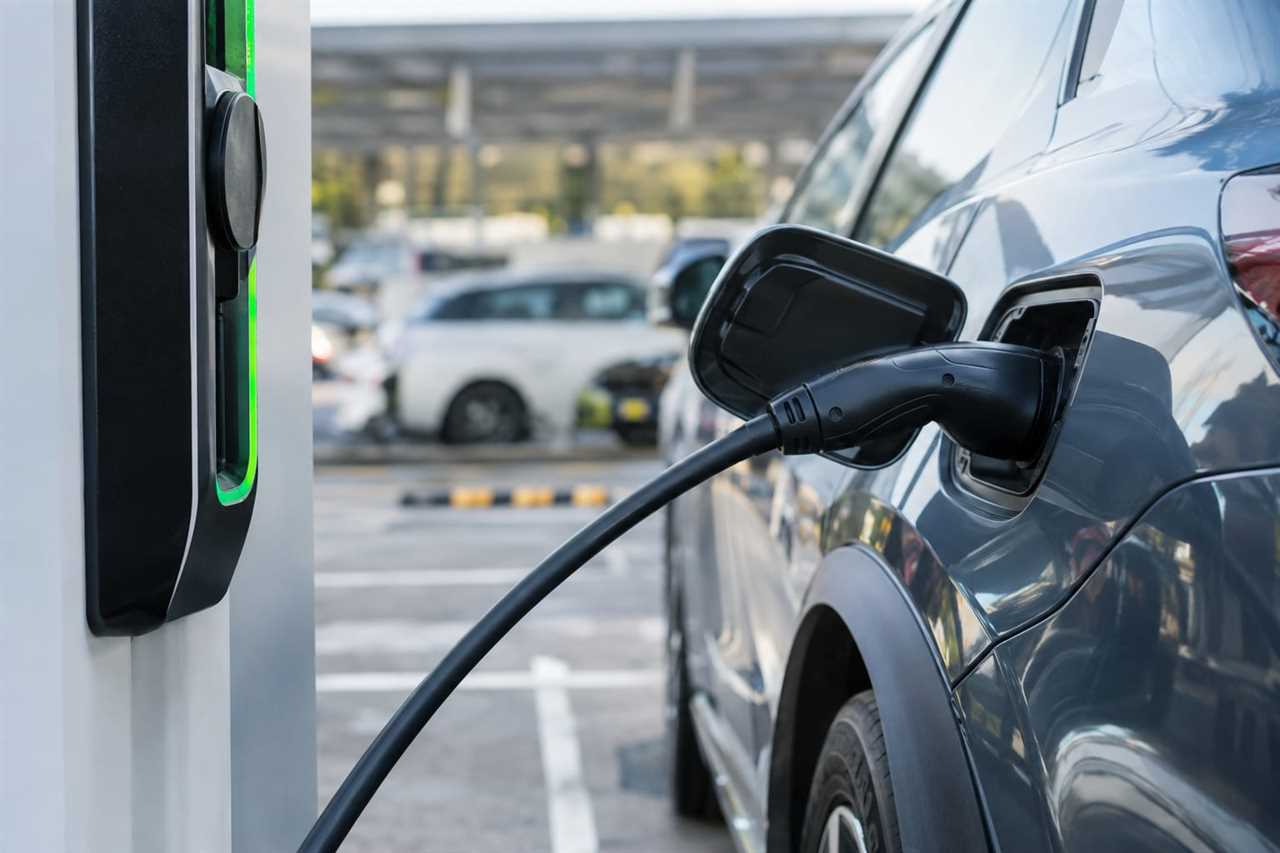 Electric vehicle connected to a charging point