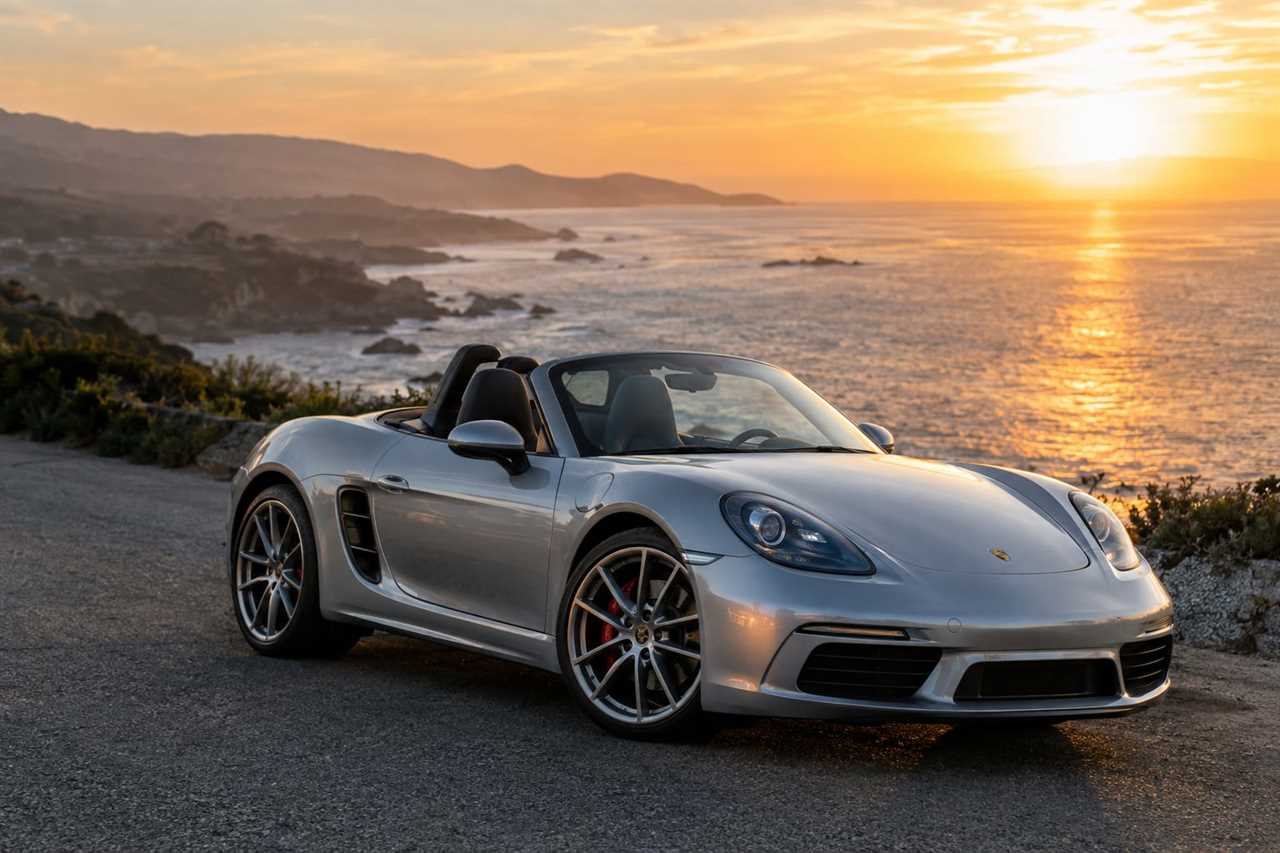 Convertible sports car cruising a coastal road