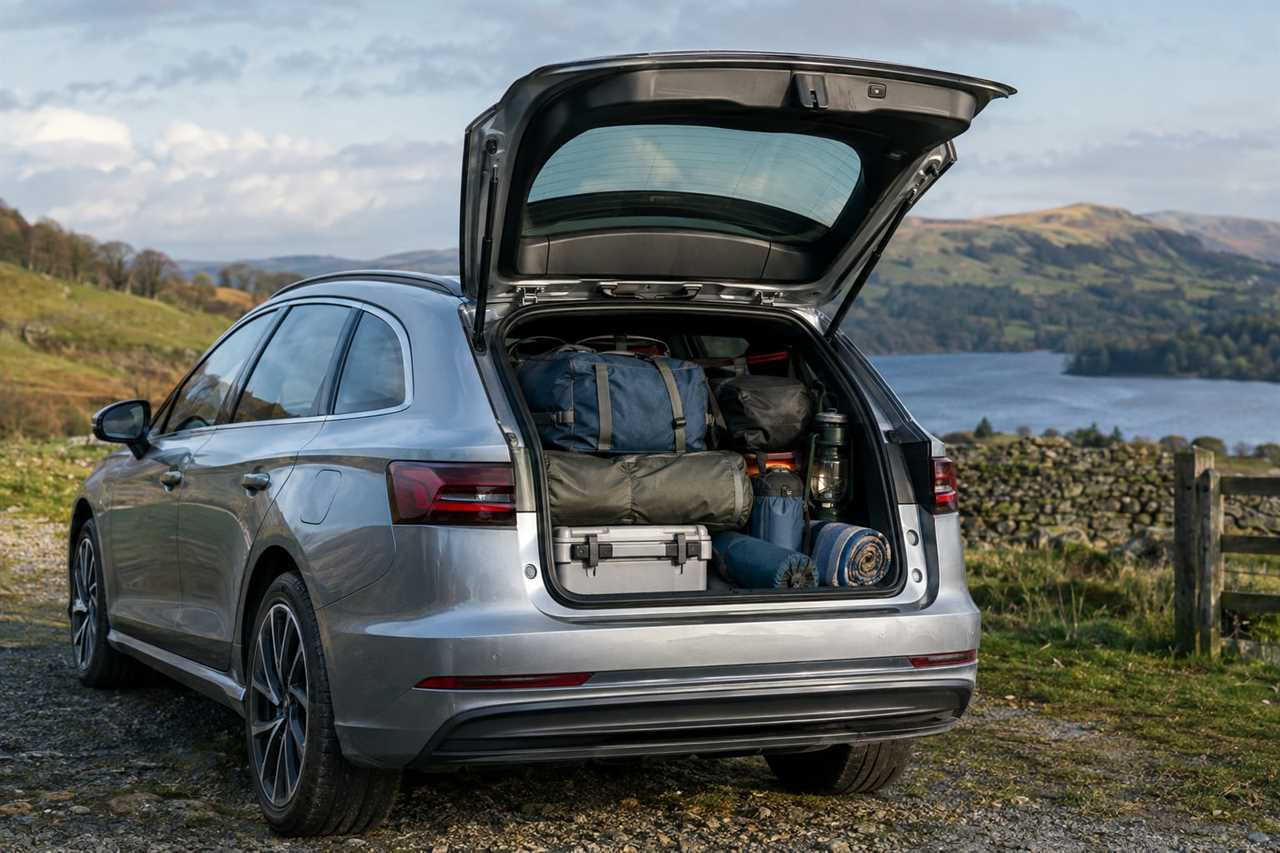 Estate car boot loaded with camping gear