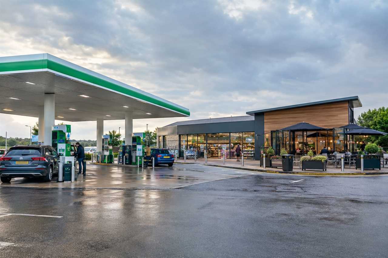 Motorway services forecourt with fuel and café facilities