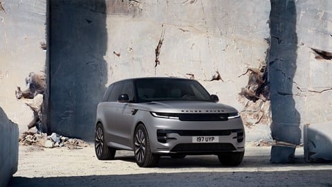 Range Rover Sport Electric (2026): front three quarter static, parked in a quarry, matte grey paint