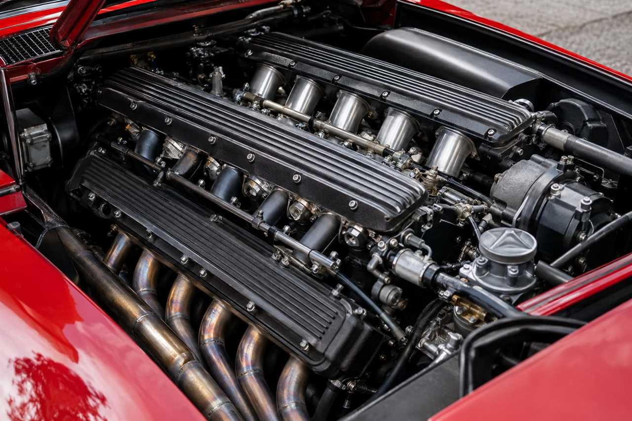 Close-up of a classic V-12 supercar engine bay.