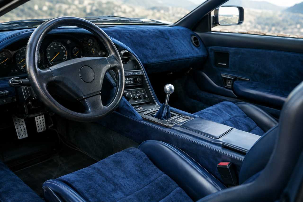 Supercar interior with blue suede upholstery.