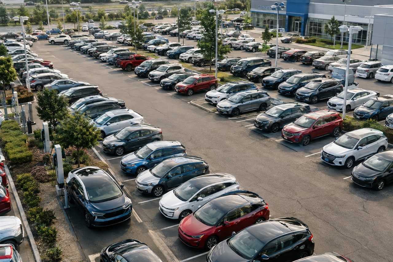 Dealership lot with mixed electric and gas vehicles