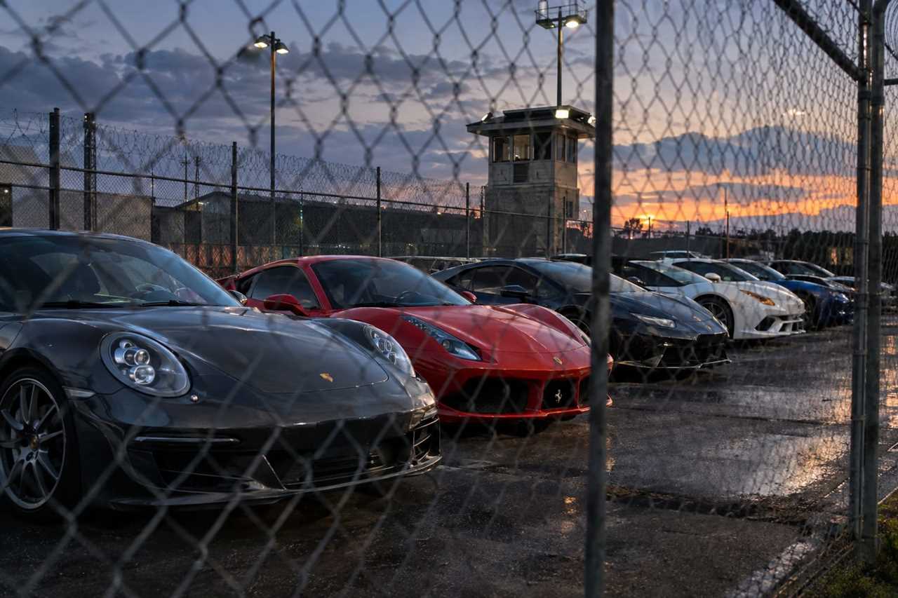 Seized supercars held in a police vehicle pound