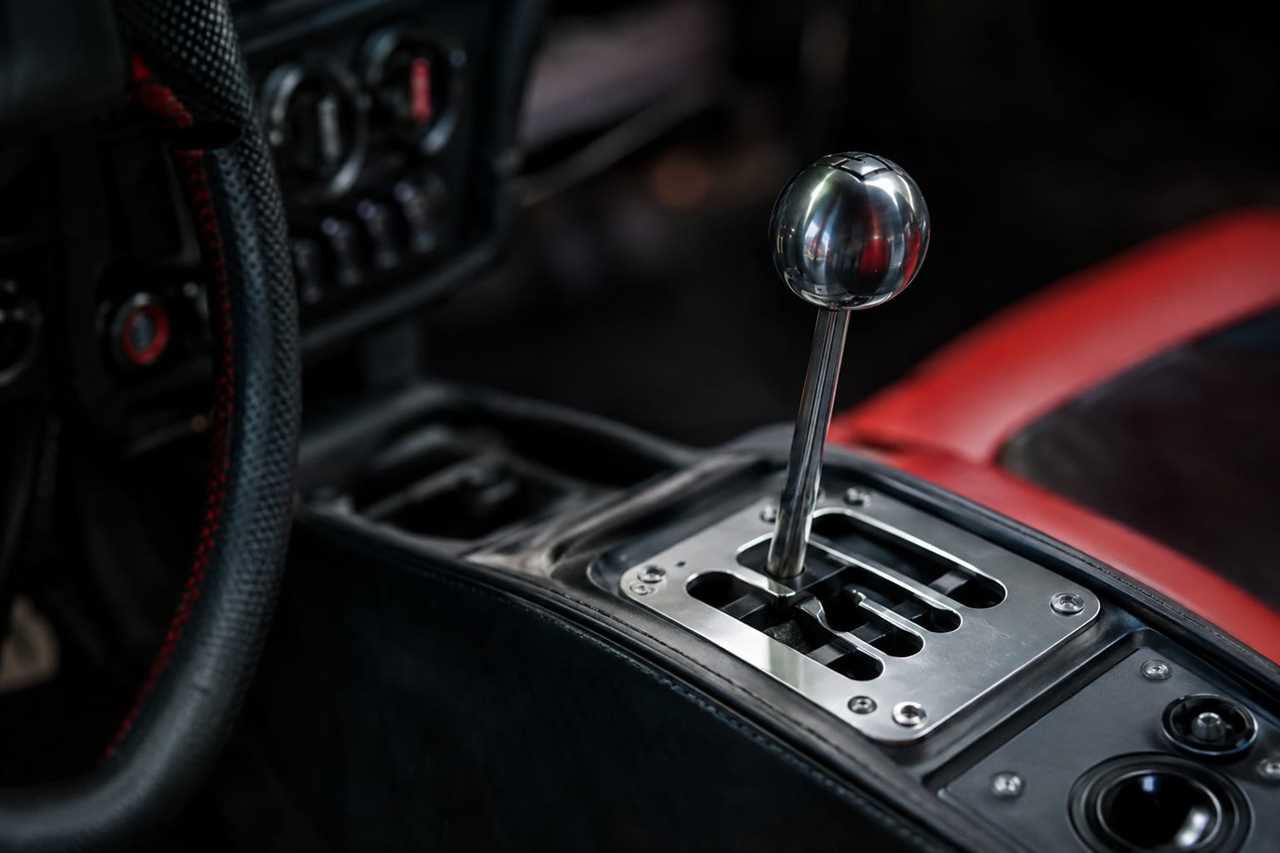Manual gearbox detail in a classic analog supercar.
