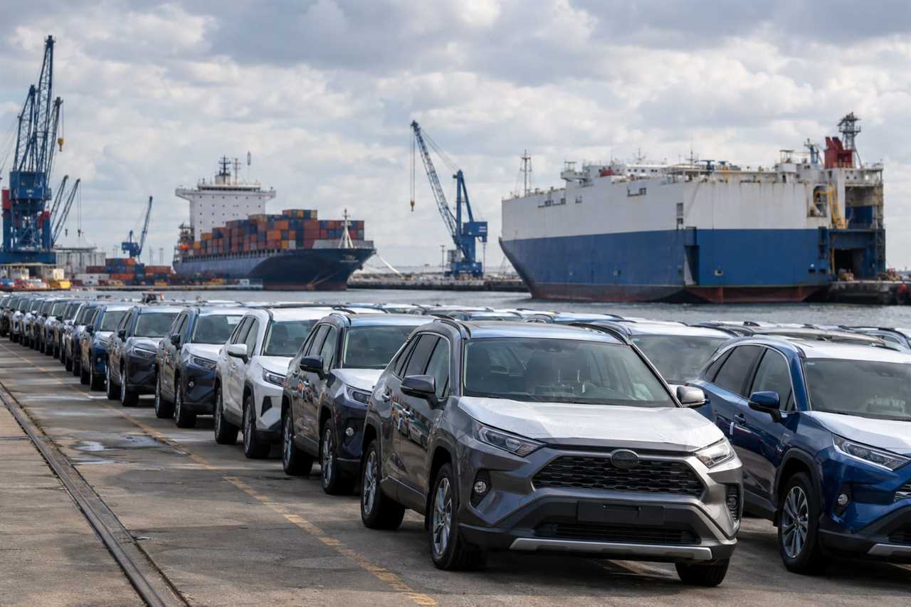 Imported hybrid cars held at a European port