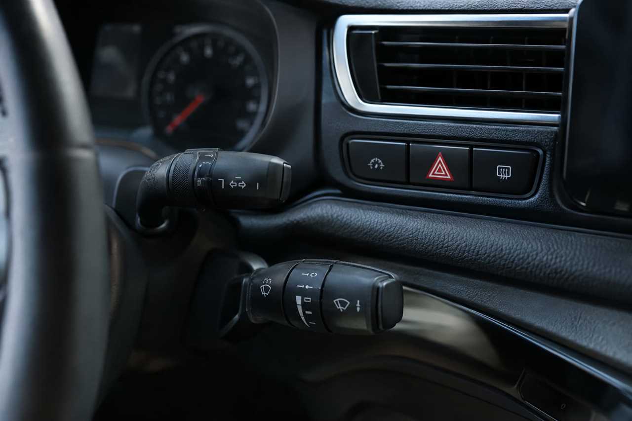 Dashboard with tactile buttons for key controls.