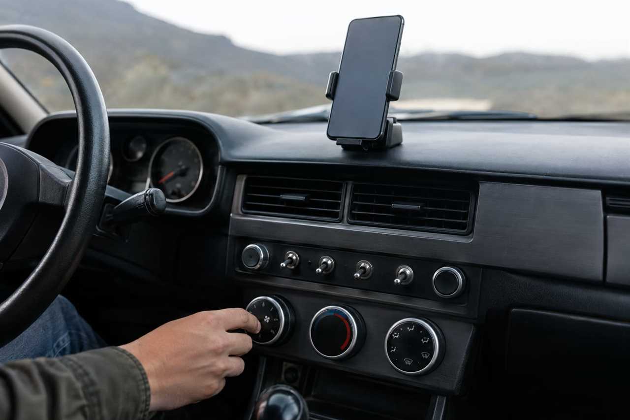 Analogue dials and phone cradle replace digital touchscreen.