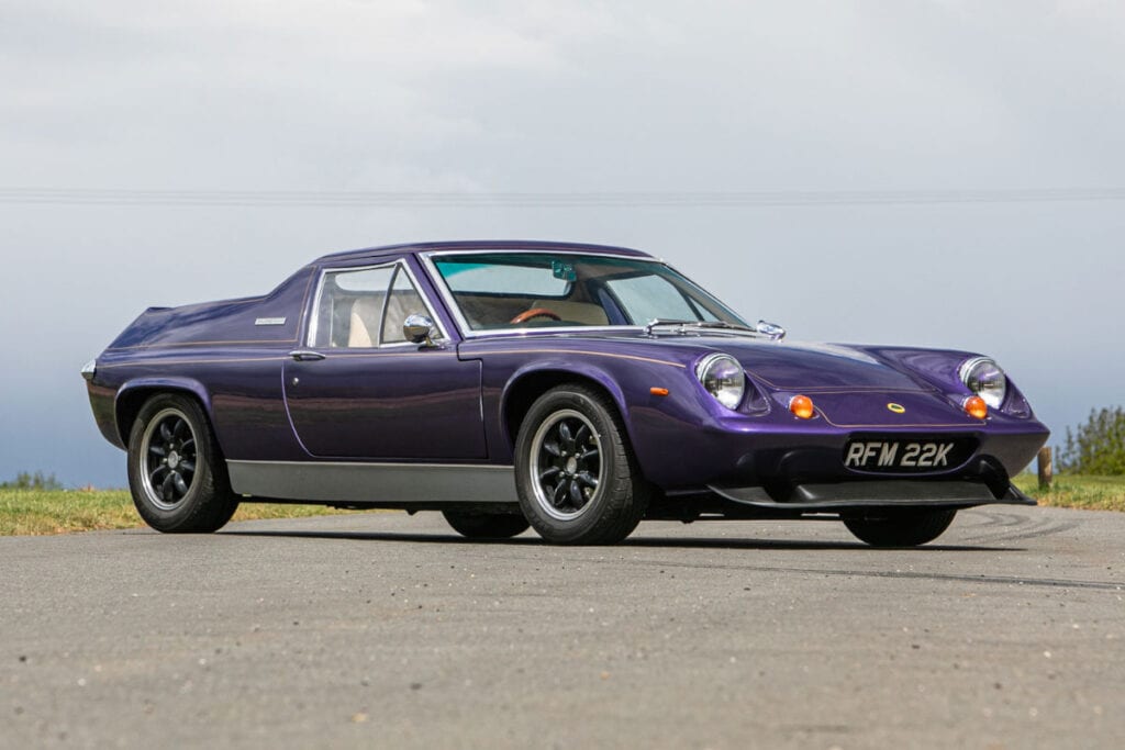 A dark purple Lotus Europa