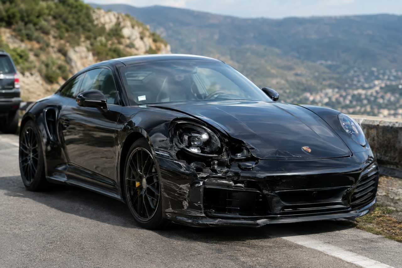 Damaged sports car following a road collision