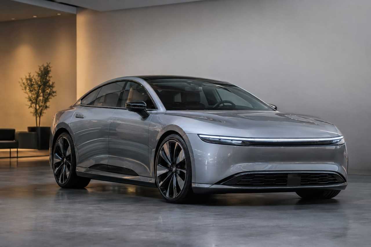 A high-end electric sedan displayed in showroom