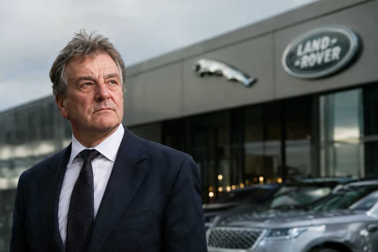 Turnover and profits reverse at car dealing giant founded by racing driver and one-time Cavern Club owner as JLR cyber attack bites