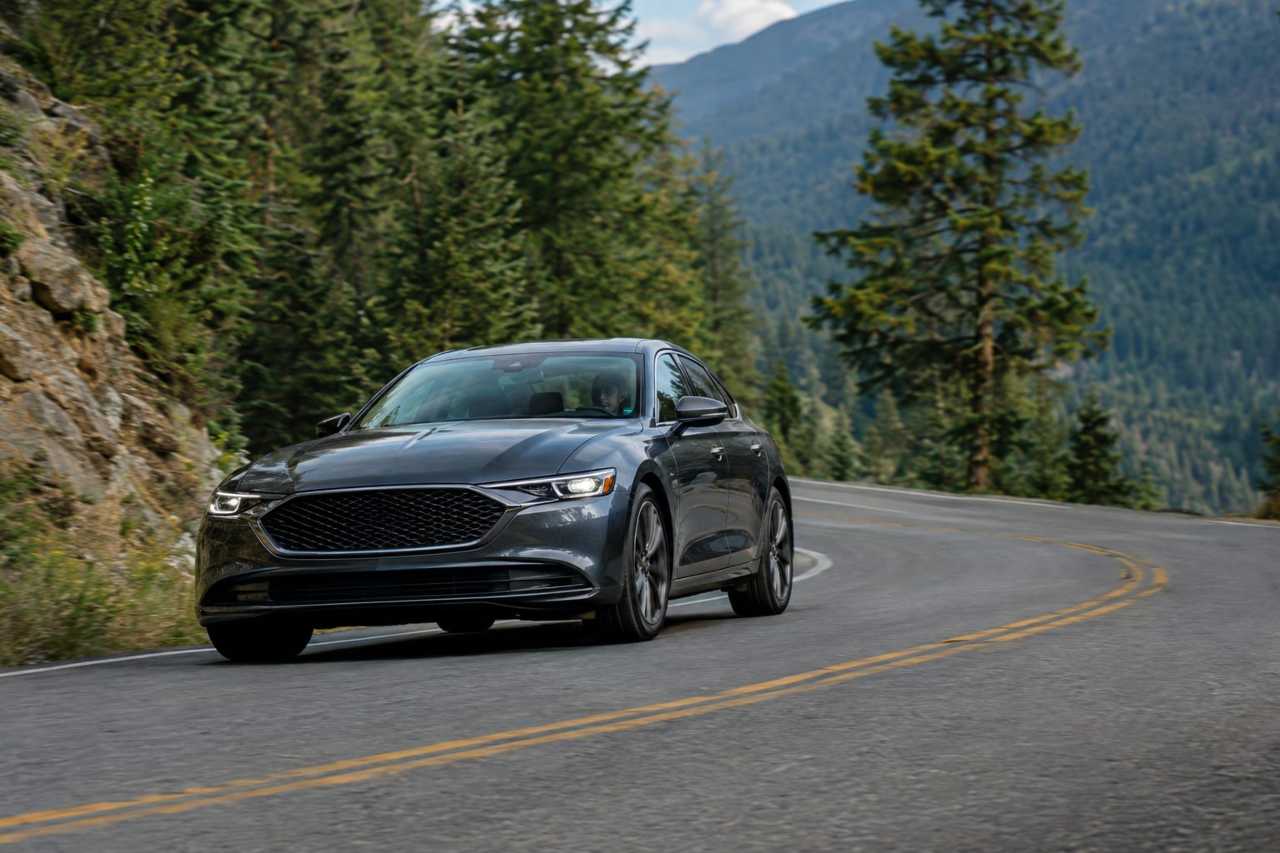 Sedan navigating a curvy mountain road