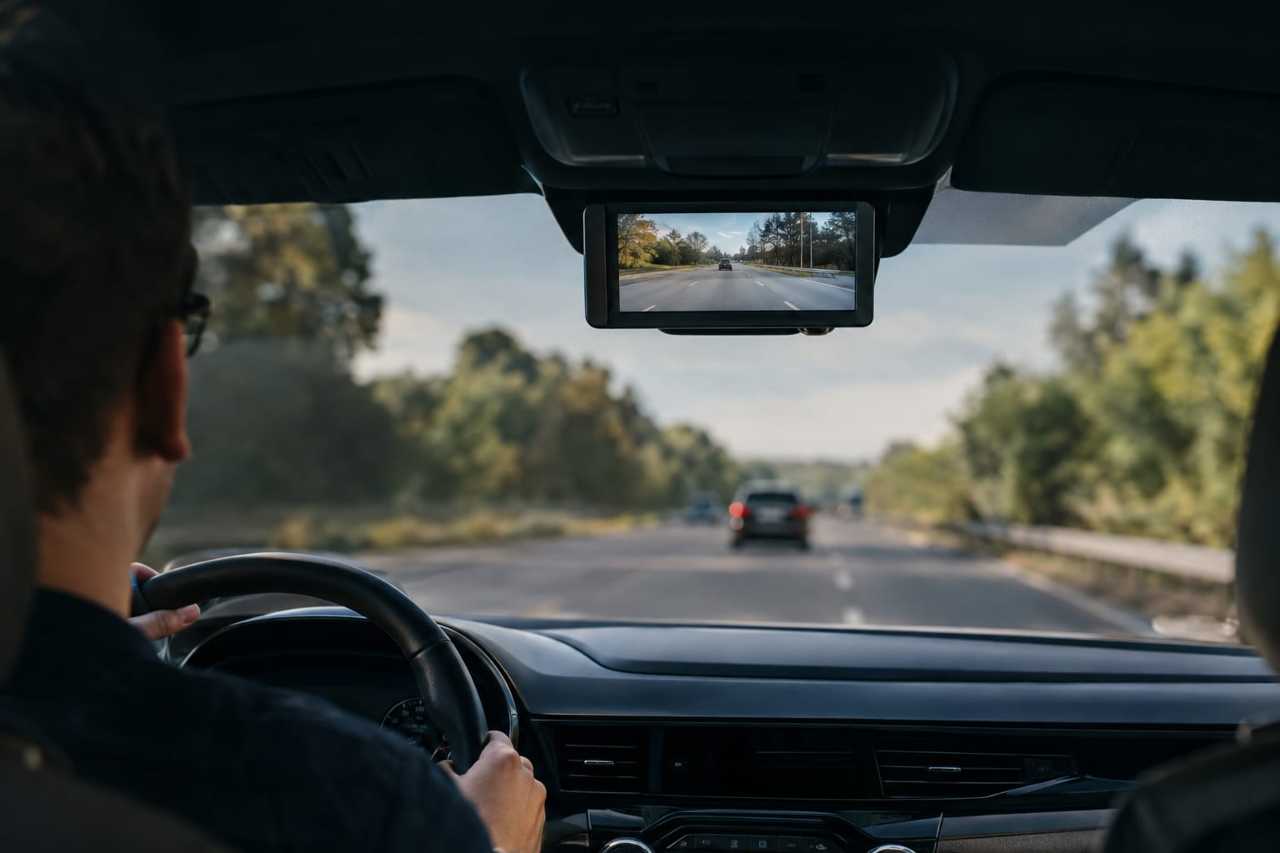Digital screen shows rear view instead of window.