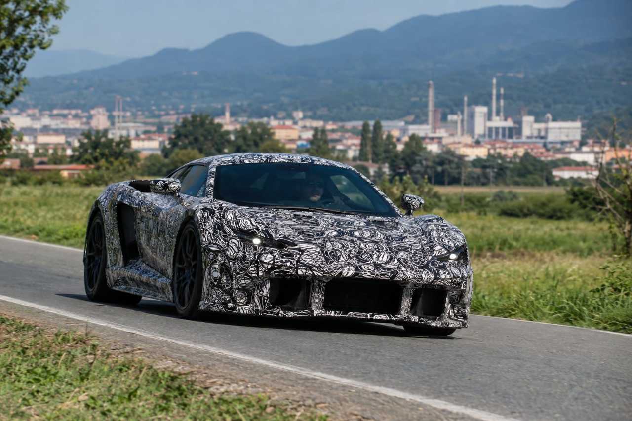 Camouflaged prototype supercar during road testing