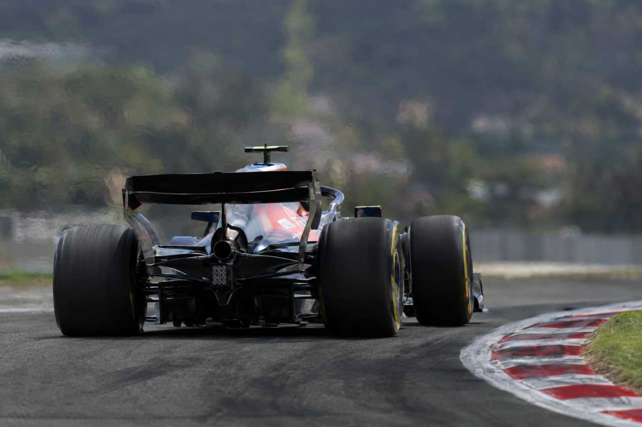 Formula 1 car speeding through a corner
