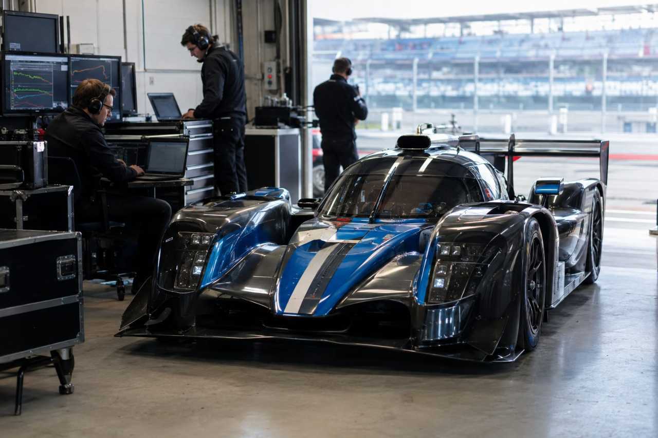 Endurance race car prepared in team pit garage
