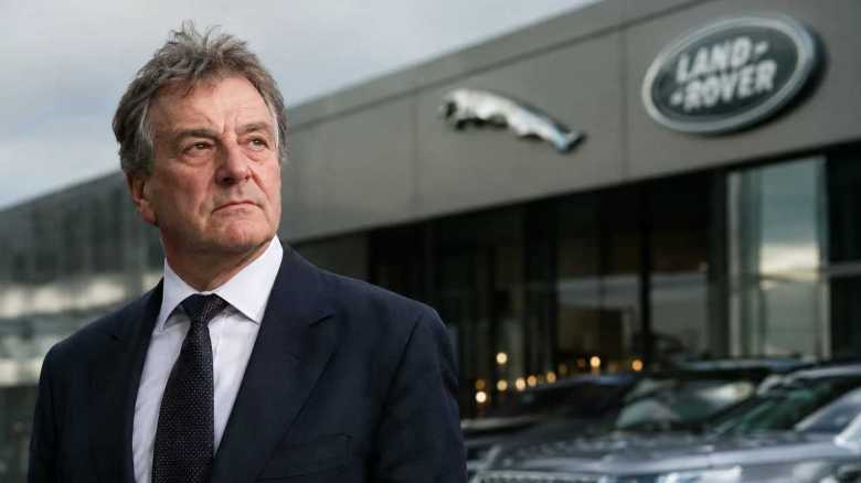 Turnover and profits reverse at car dealing giant founded by racing driver and one-time Cavern Club owner as JLR cyber attack bites